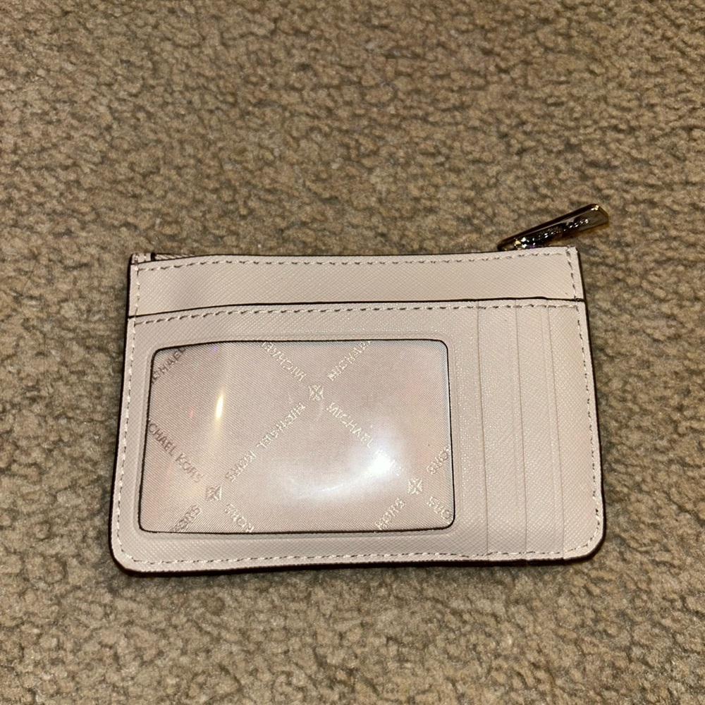 Small size Michael Kors wallet.  Like new